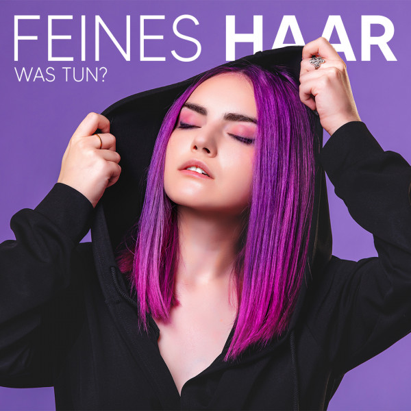 Frau mit lila Haaren und schwarzem Hoodie